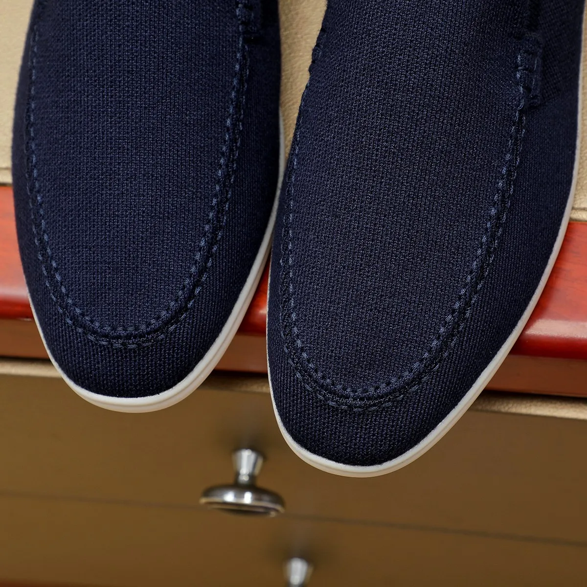 Men's Men's Shoes 💰 400 Loro PIana moccasin made of wish wool fabric. The upper is made of knitted fabric, made on a loom, and then attached to a rubber sole. The Rain System's water-repellent treatment enhances the shoe's functional design, while the suede details give the shoe a sense of elegance and sophistication. Made from Wish, fine wool from Australian and New Zealand Merino sheep 38-44